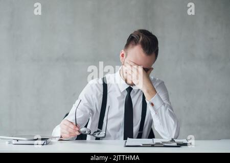 office routine deadlines stressed young manager Stock Photo