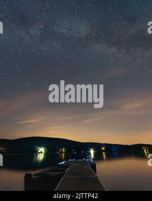 A vertical shot of the magical view of the starry Milky Way with the ...