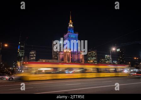 Warsaw trams by night Stock Photo