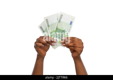 close up of hands holding euro money Stock Photo