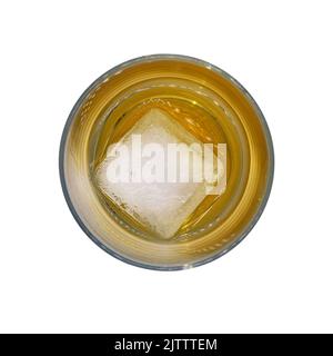 Top view of a clear glass of whisky with two round ice cubes isolated on a white background Stock Photo