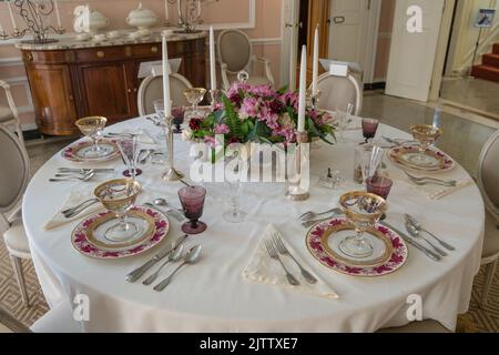 Lenox, Massachusetts, US-July 19, 2022: Formal dining room at the Mount which was the country home of the writer Edith Wharton in the early 1900s. Stock Photo