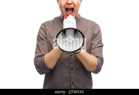 man with megaphone protesting on demonstration Stock Photo