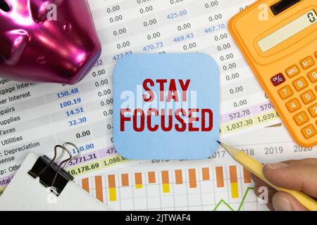 Stay Focused write on Sticky Notes Stock Photo