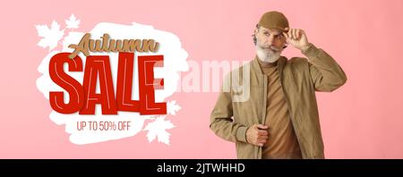 Stylish mature man on pink background. Banner for autumn sale Stock Photo