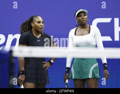 Flushing Meadow, United Stated. 01st Sep, 2022. Serena Williams and Venus Williams talk between points in their first round doubles match against Lucie Hradecka of the Czech Republic and Linda Noskova of the Czech Republic at the 2022 US Open Tennis Championships in Arthur Ashe Stadium at the USTA Billie Jean King National Tennis Center in New York City, on Thursday, September 1, 2022. Photo by John Angelillo/UPI Credit: UPI/Alamy Live News Stock Photo