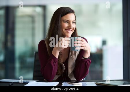 Ive done good. an attractive young businesswoman in the office. Stock Photo