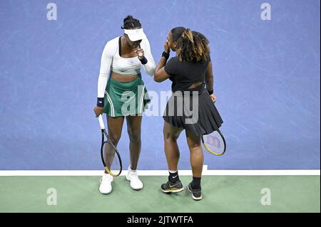 New York, USA. 01st Sep, 2022. Sisters Venus Williams (l) and Serena Williams (r), of the United States, confer during their first-round doubles match against Lucie Hradecká and Linda Nosková, of the Czech Republic, while competing in the 2022 U.S. Open tennis championships, inside Arthur Ashe stadium at at the USTA Billie Jean King National Tennis Center in Flushing Meadows Corona Park New York, September 1, 2022. (Photo by Anthony Behar/Sipa USA) Credit: Sipa USA/Alamy Live News Stock Photo