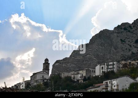 Landscape image of Fara san martino town on Majella mountain in Abruzzo region with cloudy blue sky with sunbeams. Stock Photo