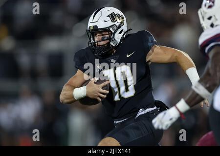 Central Florida quarterback John Rhys Plumlee (10) scrambles for ...