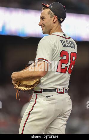 Atlanta Braves' Matt Olson (28) laughs with Michael Harris II (23