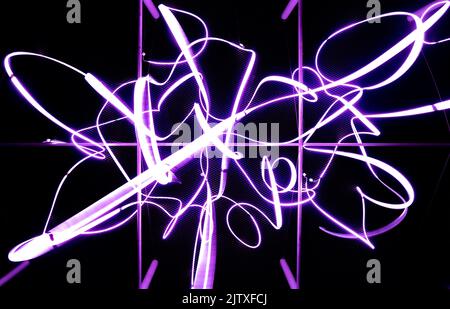White and purple coloured stripes looks like an artificial intelligence neural network and conveys modern machine learning or robotic AI training Stock Photo