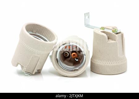 Electric ceramic socket model E27, for lighting. Selective focus with shallow depth of field. Stock Photo