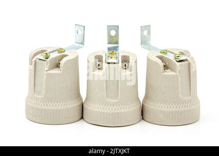 Electric ceramic socket model E27, for lighting. Selective focus with shallow depth of field. Stock Photo
