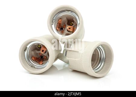 Electric ceramic socket model E27, for lighting. Selective focus with shallow depth of field. Stock Photo