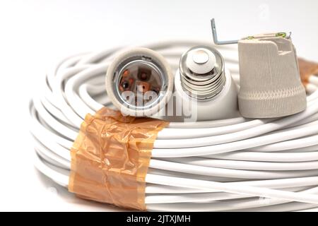 Electric ceramic socket model E27, for lighting. Selective focus with shallow depth of field. Stock Photo