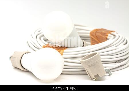 Electric ceramic socket model E27, for lighting. Selective focus with shallow depth of field. Stock Photo