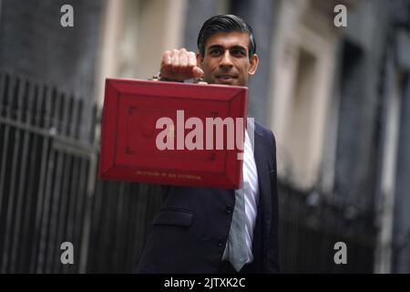 File photo dated 27/10/21 of the then Chancellor of the Exchequer Rishi Sunak holding his ministerial 'Red Box' outside 11 Downing Street, London, before delivering his Budget to the House of Commons. In just a few days Britain will find out if Liz Truss or Rishi Sunak has been picked to be the new Conservative leader and the next Prime Minister. Issue date: Friday September 2, 2022. Stock Photo