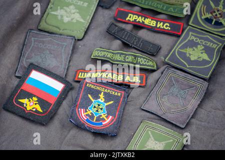 Russian soldiers various patches found in Ukraine with Russian flag, Russian Army or Armed Forces symbols with name of soldiers killed or captured Stock Photo