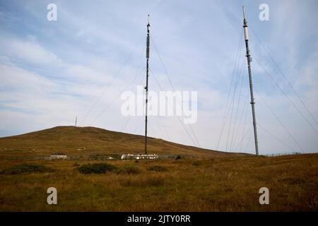 Black mountain transmitting station with the peak of divis mountain in the background in divis and black mountain belfast hills range belfast northern Stock Photo