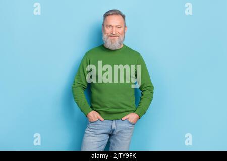 Photo of cool successful senior manager man put hands enjoy working company isolated on blue color background Stock Photo