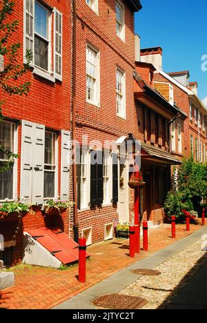 Elfreth's Alley, in Philadelphia is said to be the oldest street in continual use in America.  It has been a occupied since Colonial days Stock Photo