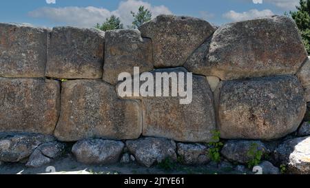 A wonderful stone wall made with large pieces of stone  in Alacahoyuk archaeological site, Corum, Turkey Stock Photo