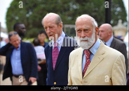 His Royal Highness the Duke of Kent (left) and His Royal Highness Prince Michael of Kent (right) at the 2022 Concours of Elegance which is taking place in the grounds of Hampton Court Palace, London, UK. The Concours of Elegance brings together a selection of 80 of the rarest cars from around the world - many of which will never have been seen before in the UK. Complementing the Concours of Elegance will be displays of other fine motor cars, including entrants to The Club Trophy. Credit: Michael Preston/Alamy Live News Stock Photo