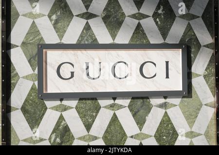 Singapore Marina bar 12 June 2022. Gucci sign on a marble wall. Stock Photo