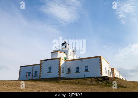 Strathy Point Lighthouse location on the tip of a peninsula at the very top of Scotland between Cape Wrath and Joan O'Groats. Stock Photo