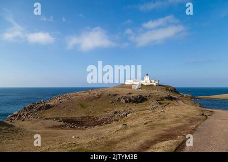 Strathy Point Lighthouse location on the tip of a peninsula at the very top of Scotland between Cape Wrath and Joan O'Groats. Stock Photo