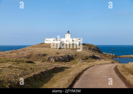 Strathy Point Lighthouse location on the tip of a peninsula at the very top of Scotland between Cape Wrath and Joan O'Groats. Stock Photo