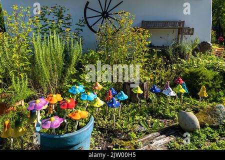 garden decorated with ceramics in Holloko, region Northern Hungary Stock Photo