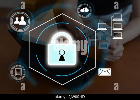 Cybersecurity and privacy concepts to protect data. Lock icon and internet network security technology. Businessman protecting personal data on smart Stock Photo