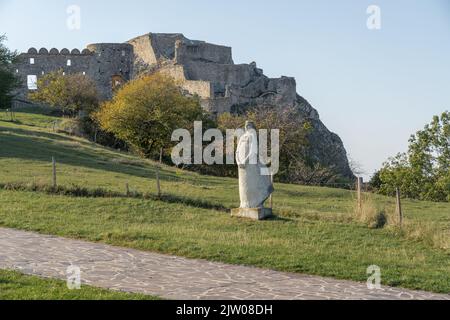 Statue of a woman and Devin Castle ruins - Bratislava, Slovakia Stock Photo