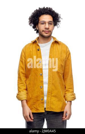 man in glasses and yellow jacket Stock Photo