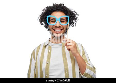 happy smiling man with glasses party accessory Stock Photo