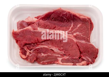 Raw beef steak in styrofoam food tray isolated on white, clipping path Stock Photo