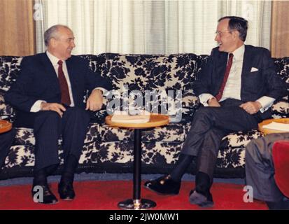 United States President George H.W. Bush, right, and General Secretary of the Communist Party of the Soviet Union (CPSU) Mikhail Gorbachev, left, meet aboard the Maksim Gorkiy at Malta during an international summit on December 2, 1989.Mandatory Credit: David Valdez / White House via CNP /MediaPunch Stock Photo