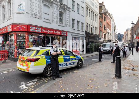 A fatal stabbing allegedly occurred in Korean restaurant Arirang, on Poland Street on the side of Oxford Street.   Police and forensics arrive at the Stock Photo