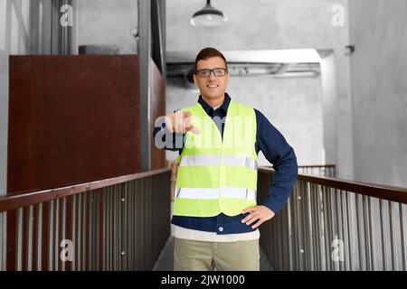 male worker in safety west at office Stock Photo