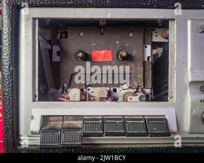 Close up photo of an old and dusty classic tape recorder or tape player Stock Photo