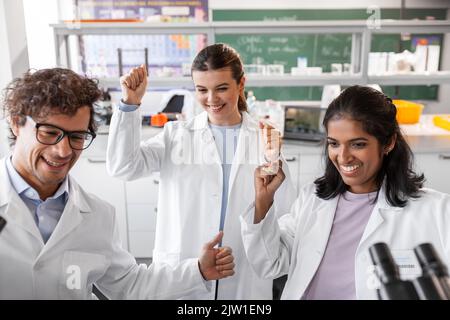 international group of scientists in laboratory Stock Photo