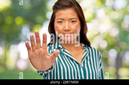 close up of woman showing stop gesture Stock Photo