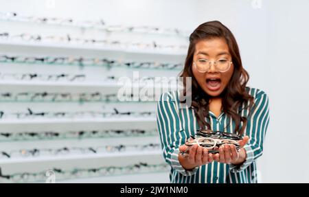 surprised woman with glasses Stock Photo