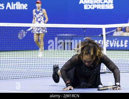 Flushing Meadow, USA. 02nd Sep, 2022. Serena Williams gets up after falling to the court playing a volley at net in the second set against Ajla Tomljanovic of Australia in the third round at the 2022 US Open Tennis Championships in Arthur Ashe Stadium at the USTA Billie Jean King National Tennis Center in New York City, on Thursday, September 2, 2022. Serena announced last month she will be stepping away from tennis to focus on growing her family and other pursuits. Photo by John Angelillo/UPI Credit: UPI/Alamy Live News Stock Photo