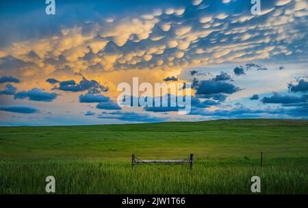 Mammatus clouds over a farm road in South Dakota, near Belle Fourche Stock Photo