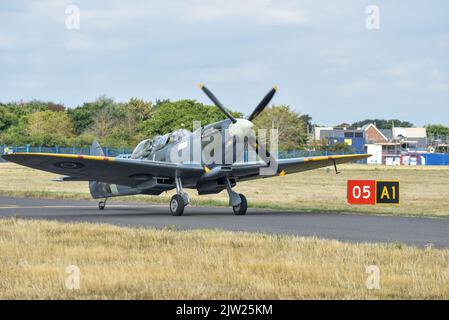 SM250 twin seat Spitfire taxiing on the runway of Solent airport. Taking another passenger on a pleasure flight around the south coast of England. Stock Photo