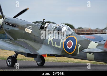 SM250 twin seat Spitfire taxiing on the runway of Solent airport. Taking another passenger on a pleasure flight around the south coast of England. Stock Photo