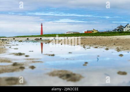 Reflection of lighthouse of Andenes, Andoya, island of Vestralen, Provinz Nordmark, Norway Stock Photo